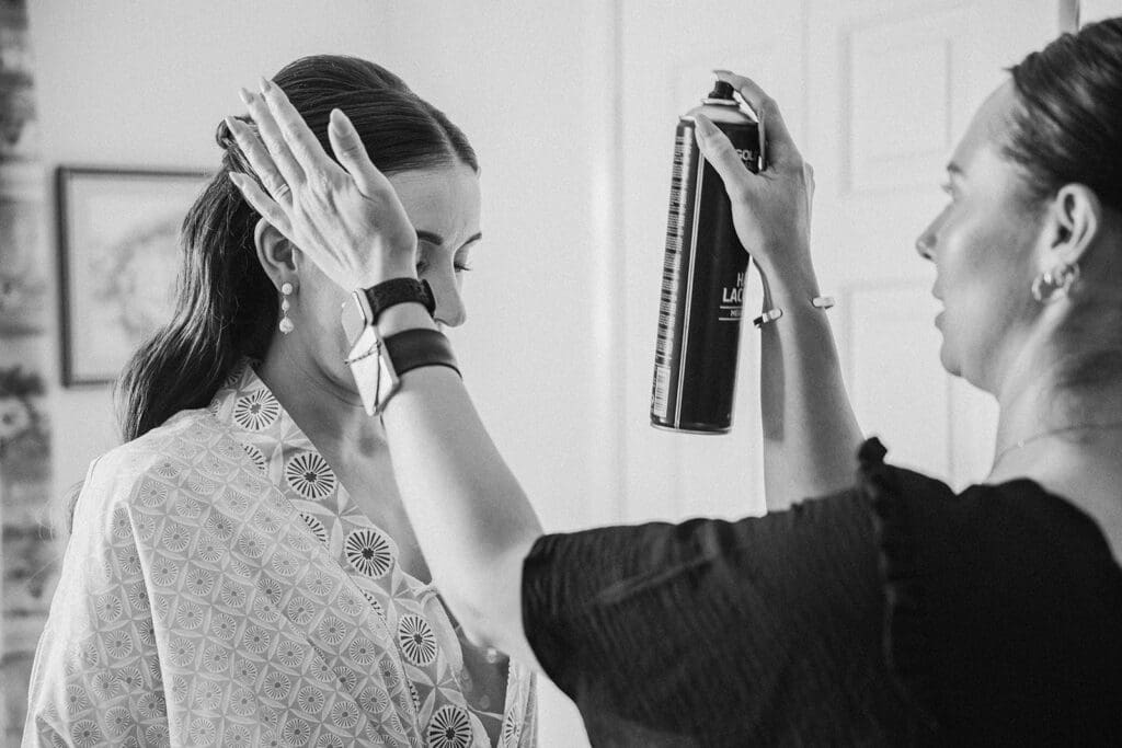 Bride getting ready at her family home before Staunton Harold Hall wedding