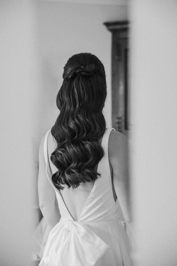 Bride getting ready at family home before Staunton Harold Hall wedding