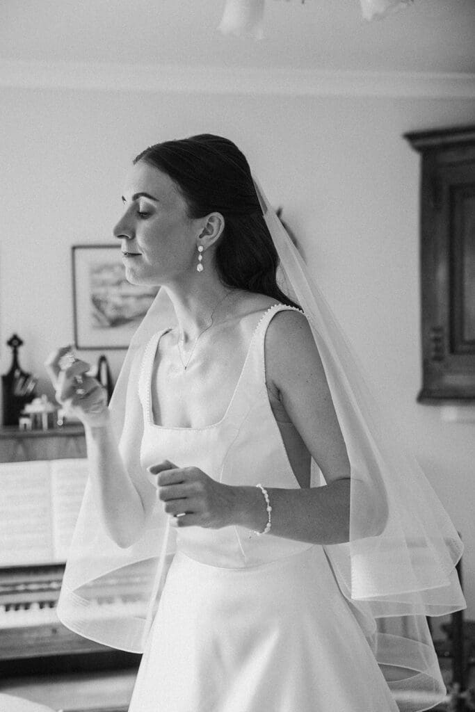 Bride getting ready at family home before Staunton Harold Hall wedding