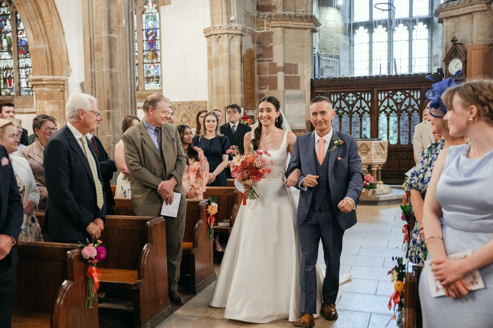 Bride entering St Helen’s Church for the wedding ceremony