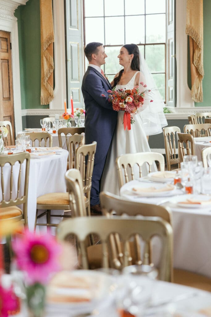 Couple sharing a quiet moment together in the reception room at Staunton Harold Hall