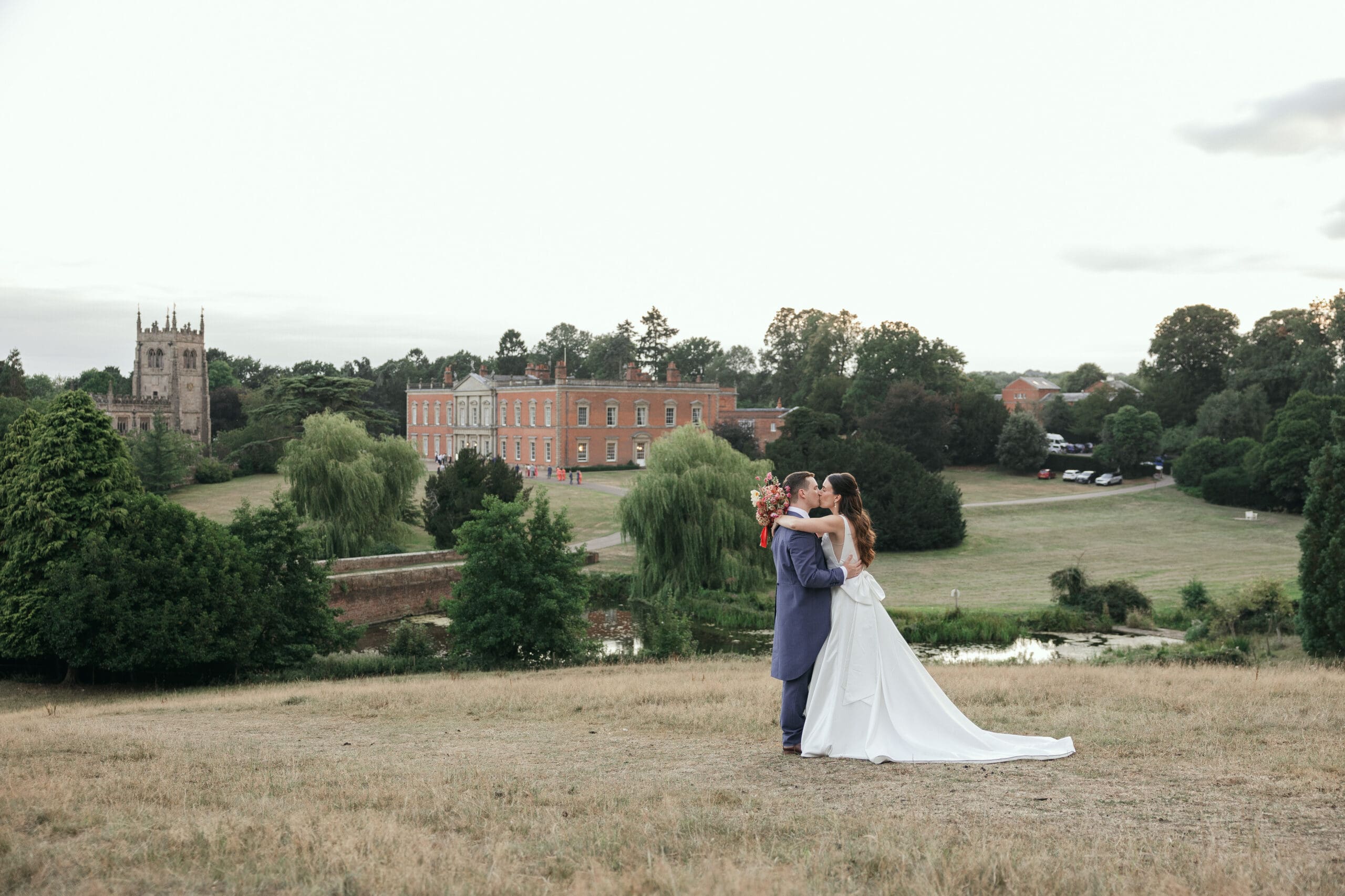 Wedding couple sharing a quiet moment in the parkland at Staunton Harold Hall wedding photographer