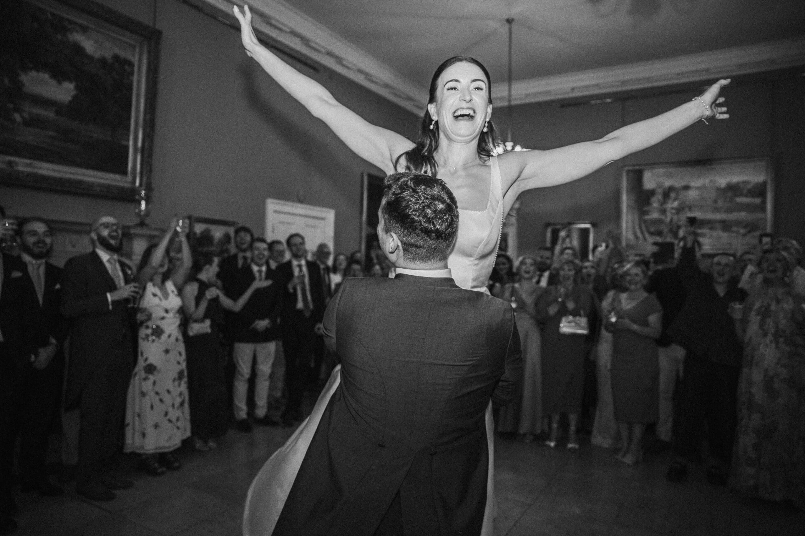 Bride and groom dancing during the wedding reception at Staunton Harold Hall