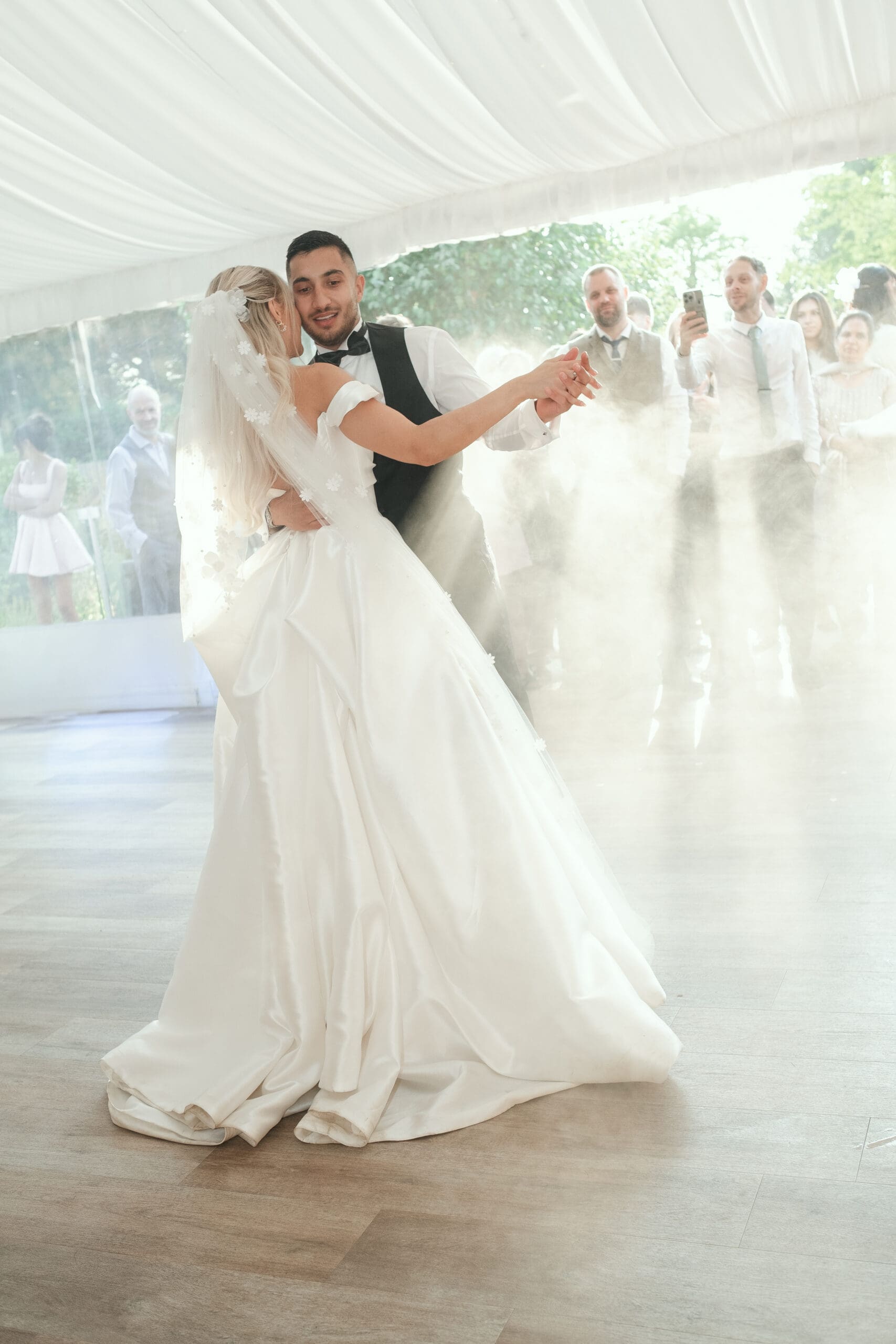 Bride and groom first dance during golden hour at The Hop Rooms Wisbech wedding