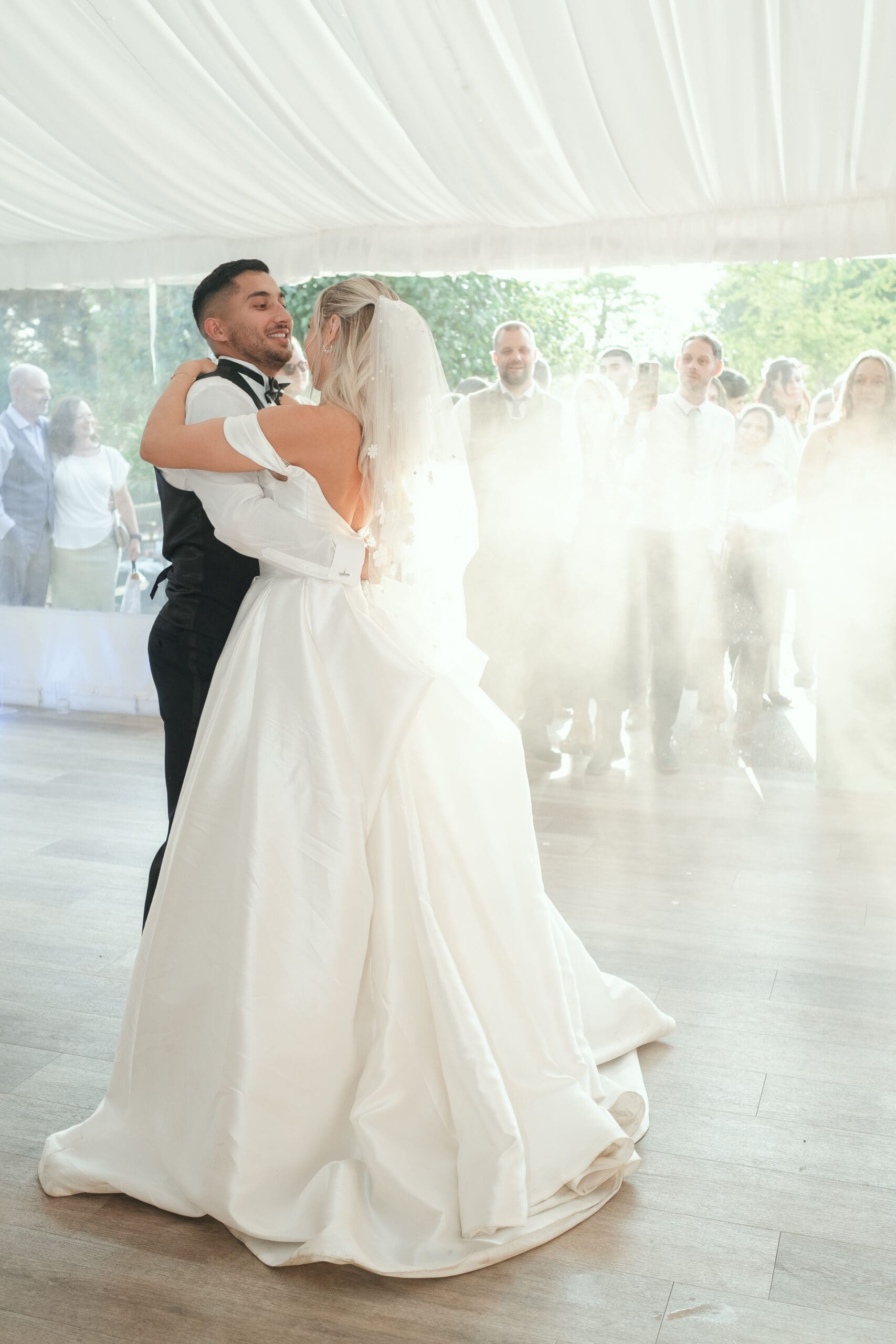 Bride and groom first dance during golden hour at The Hop Rooms Wisbech wedding