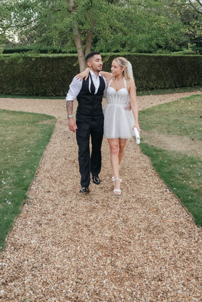 Reception outfit change from ballgown to glittering mini dress during Hop Rooms wedding