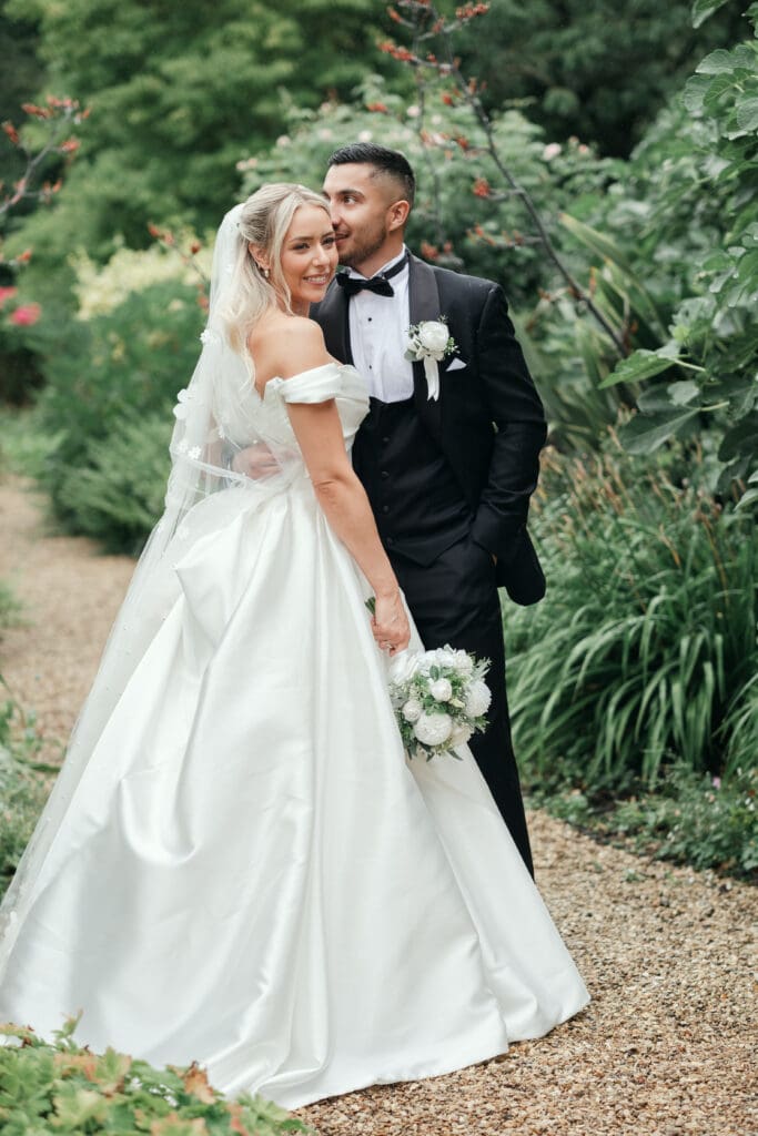 Bride and groom portraits in the lush gardens of The Hop Rooms in Wisbech