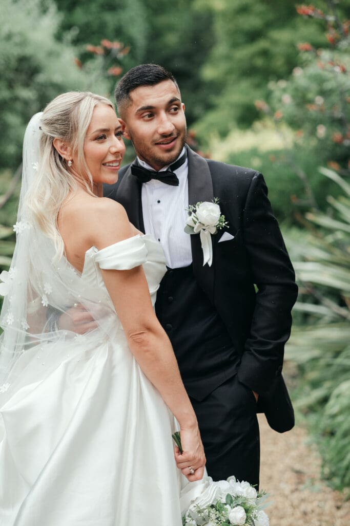 Bride and groom portraits in the lush gardens of The Hop Rooms in Wisbech