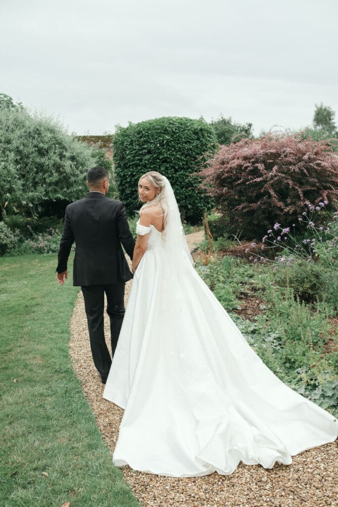 Romantic garden wedding portraits at The Hop Rooms Cambridgeshire venue